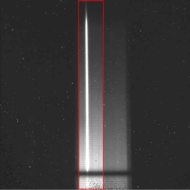Raw image with red lines flanking a bright rectangular area with a visible spectral trace.